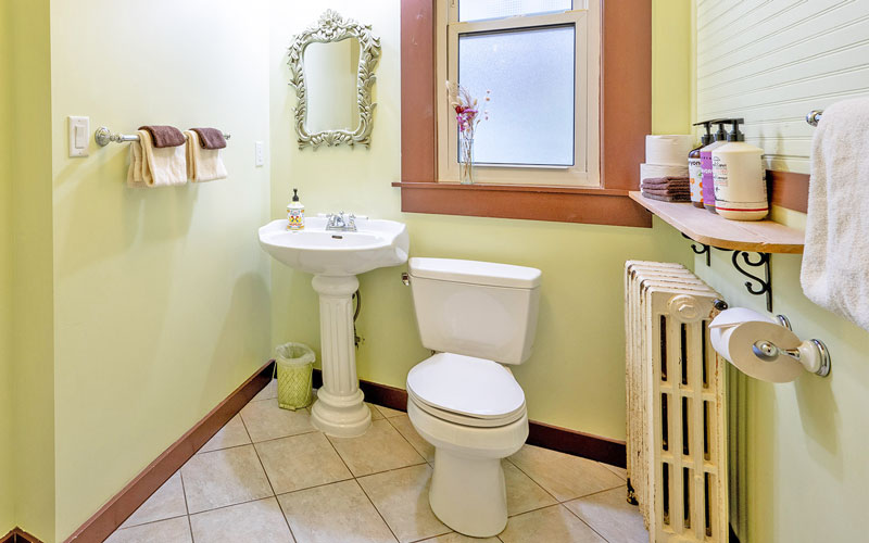 Baker-Suite-Bathroom-at-Victoria-Falls-House-Nelson-BC Spacious bathroom with a shower and updated fixtures in the Baker Suite at Victoria Falls House, Nelson BC.